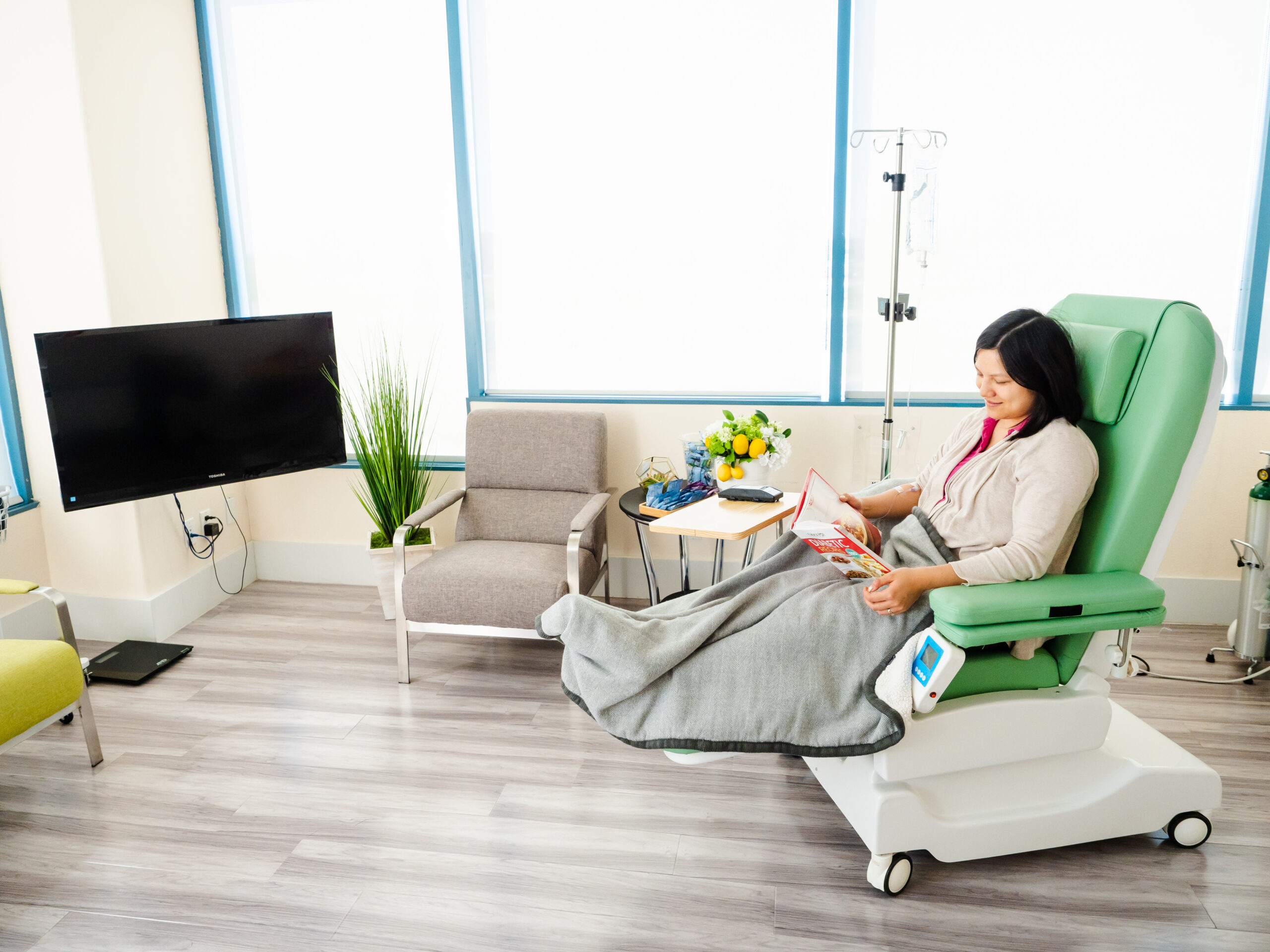 Patient receiving infusion at Trinity infusion center