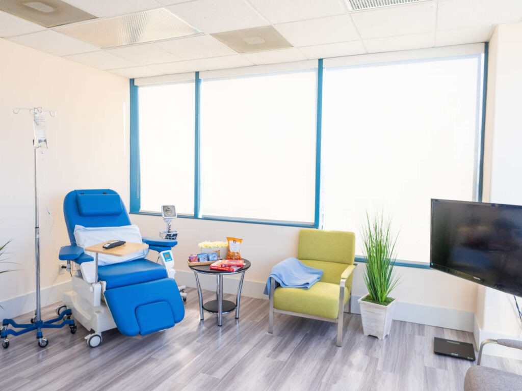 Empty infusion center chair and guest chair