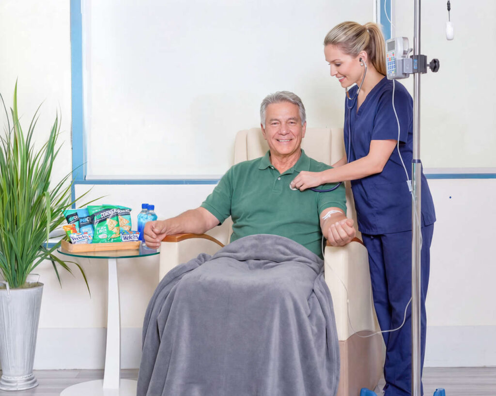Male patient receiving neurological infusion at an infusion clinic