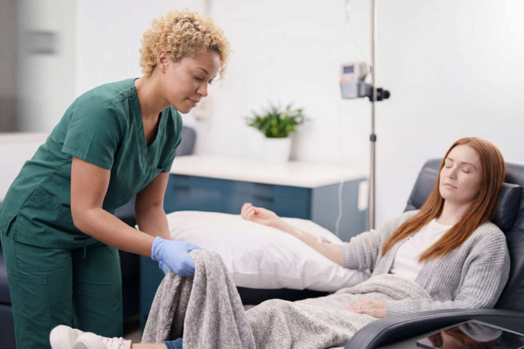 Nurse and patient at AmeriPharma Infusion Center in Trinity